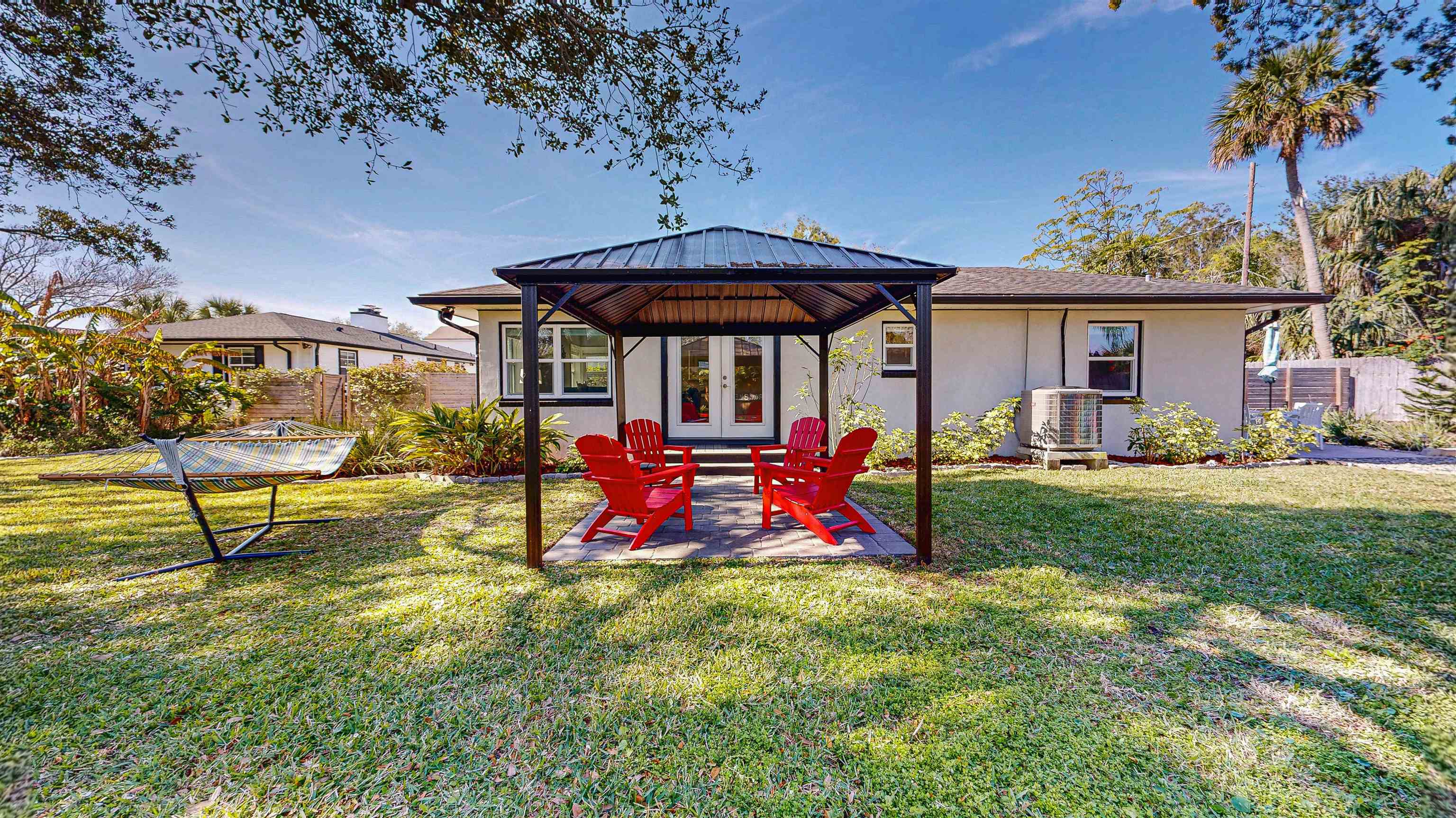 312 Minorca Avenue St. Augustine, FL 32080 - Photo 31 of 56 a view of a house with backyard and porch