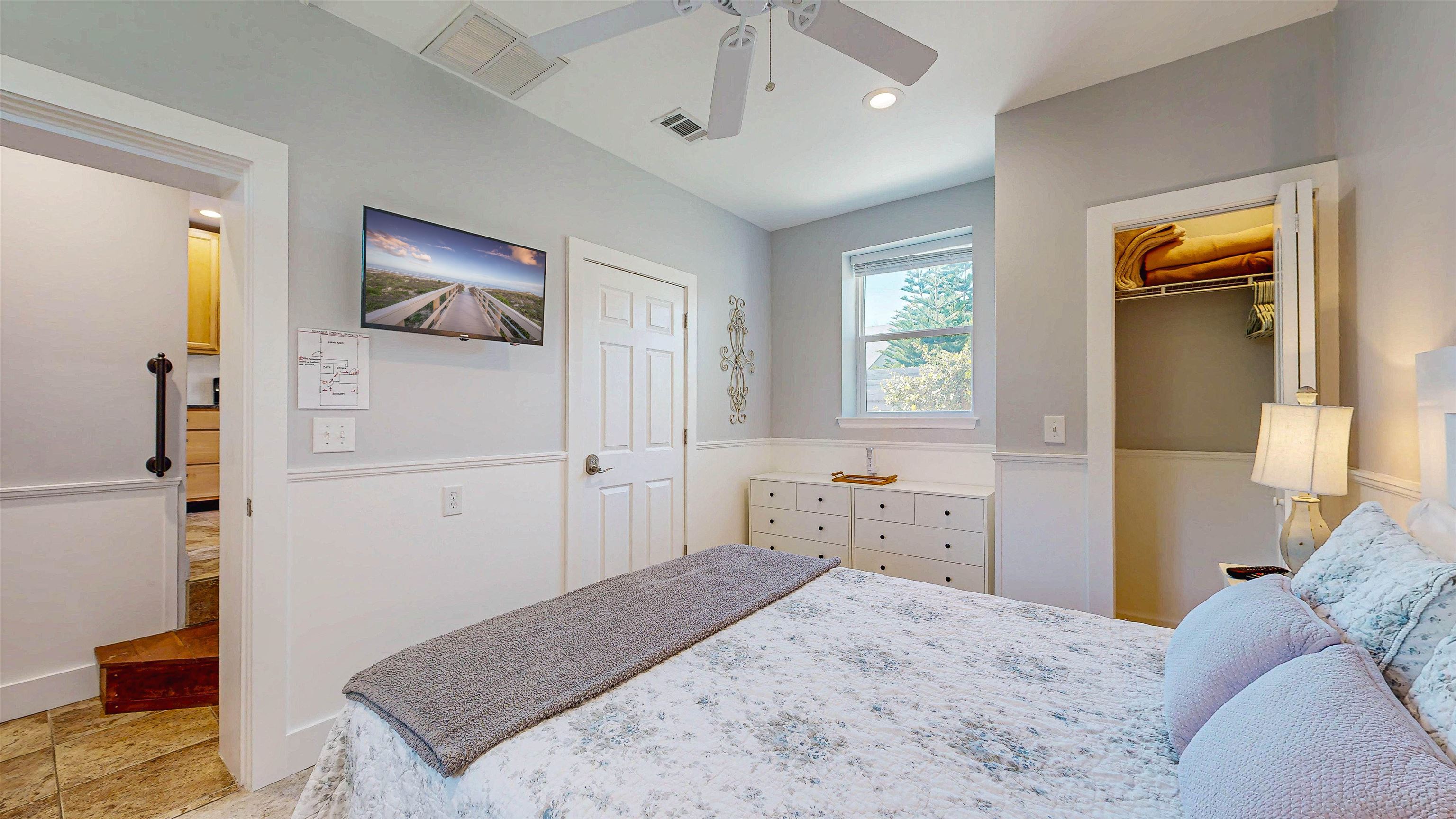 312 Minorca Avenue St. Augustine, FL 32080 - Photo 38 of 56 a bedroom with a bed and a couch