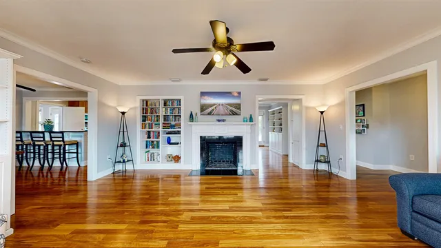 a view of a dining room with furniture and window