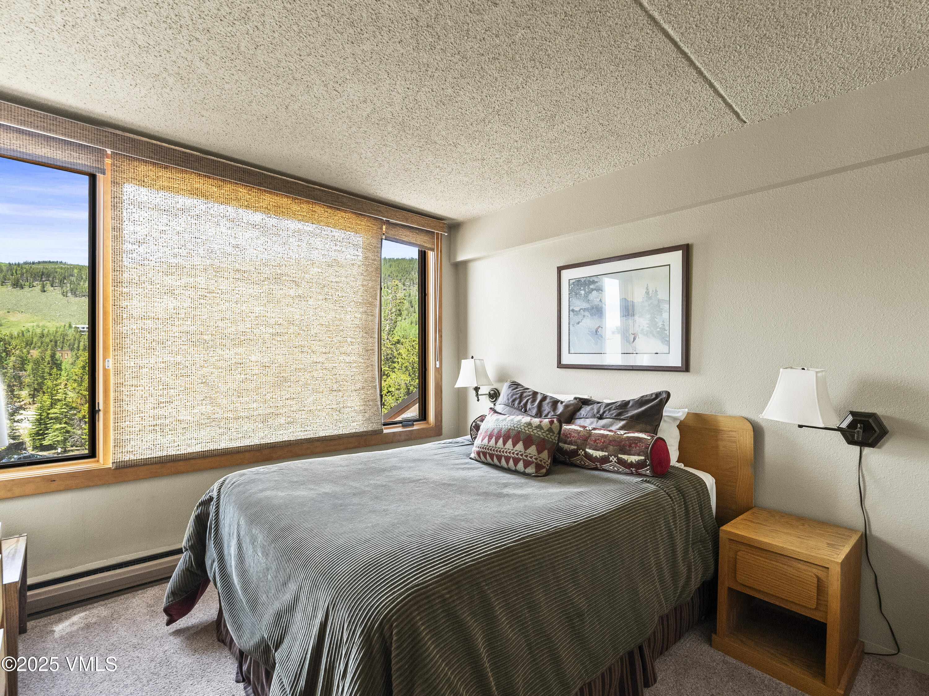 2340 Route 6, Unit 1794 Wellfleet, MA 02667 - Photo 11 of 20 a bedroom with a bed and wooden floor