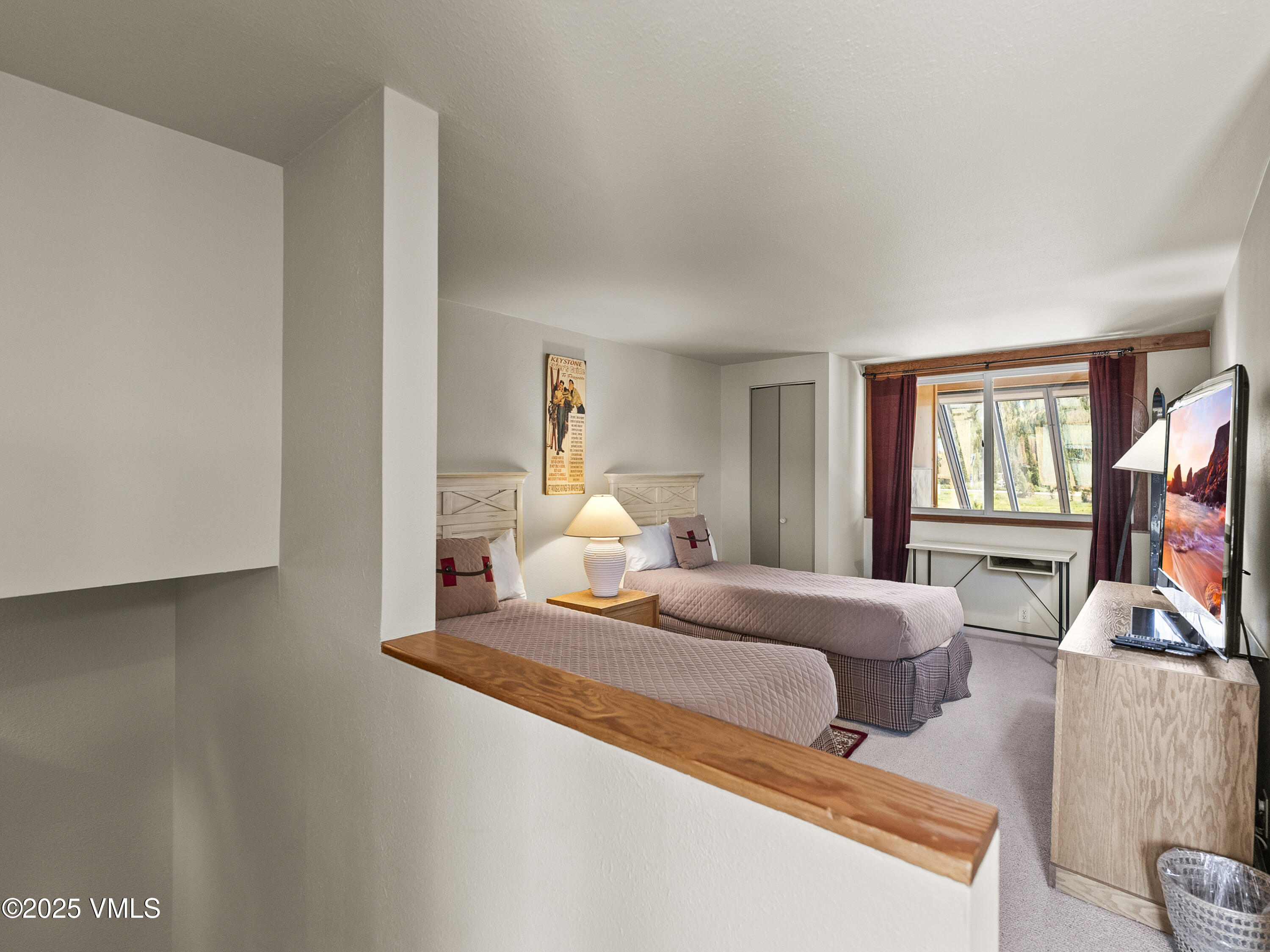 2340 Route 6, Unit 1794 Wellfleet, MA 02667 - Photo 13 of 20 a bedroom with a bed wooden floor and window