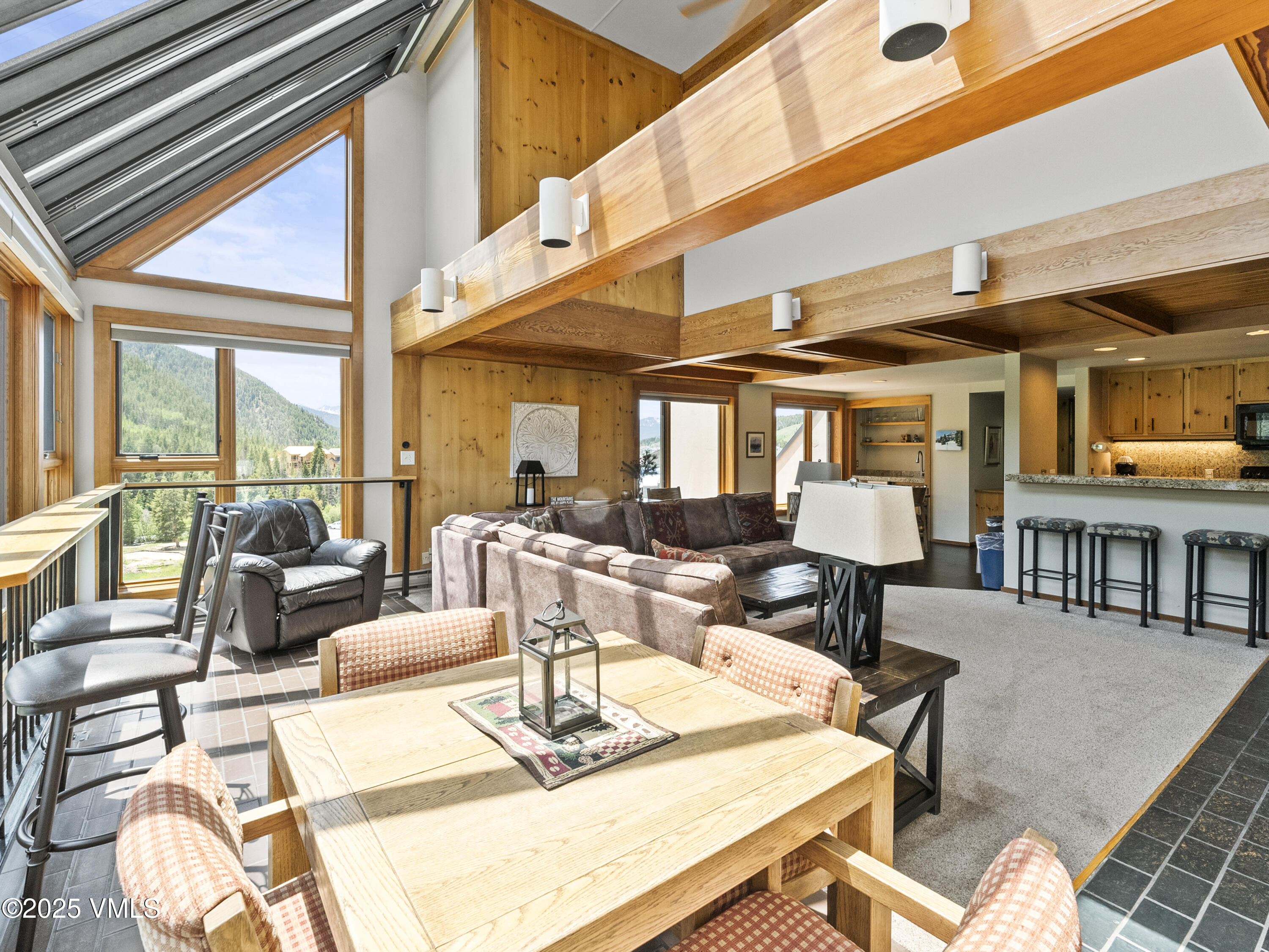 2340 Route 6, Unit 1794 Wellfleet, MA 02667 - Photo 5 of 20 a living room with fireplace furniture and a large window