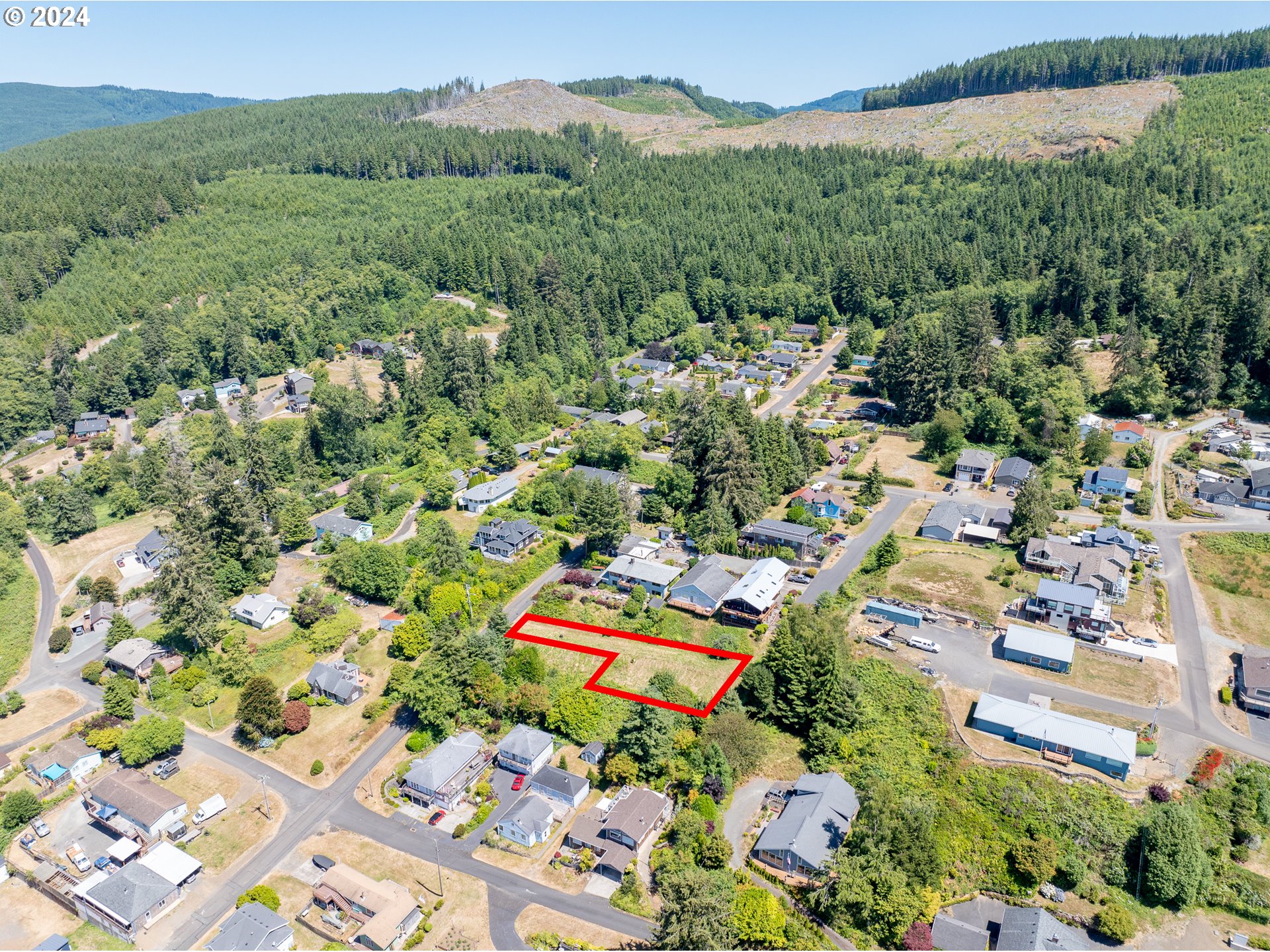Spruce Street Wheeler, OR 97147 - Photo 15 of 15 an aerial view of a city with lots of residential buildings
