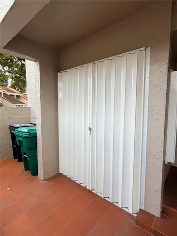 a view of a room with a window