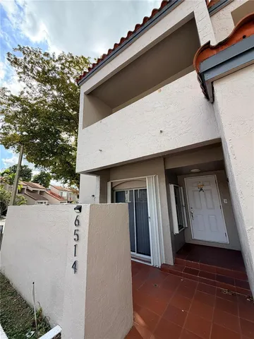 a view of a house with a large space