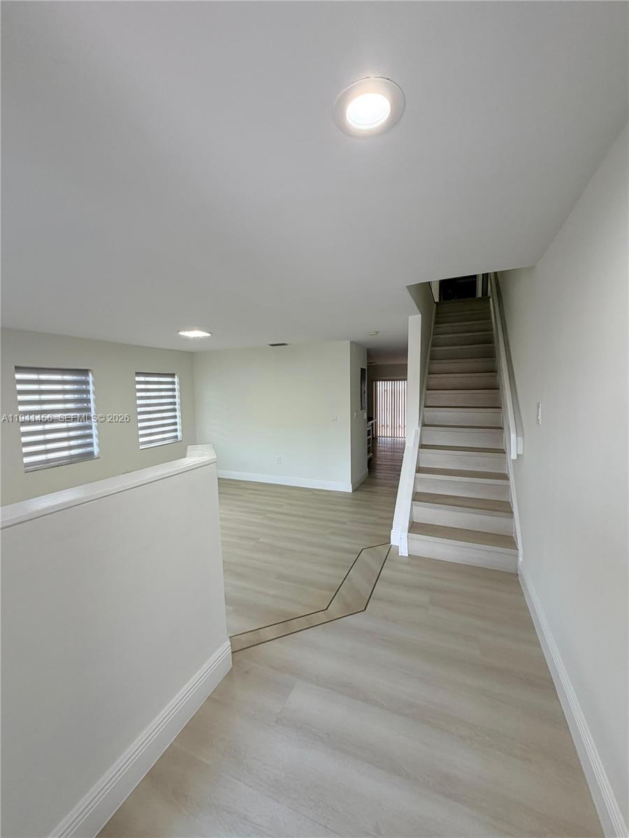6514 Southwest 128th Place, Unit 6514 Miami, FL 33183 - Photo 6 of 18 a view of entryway and hall