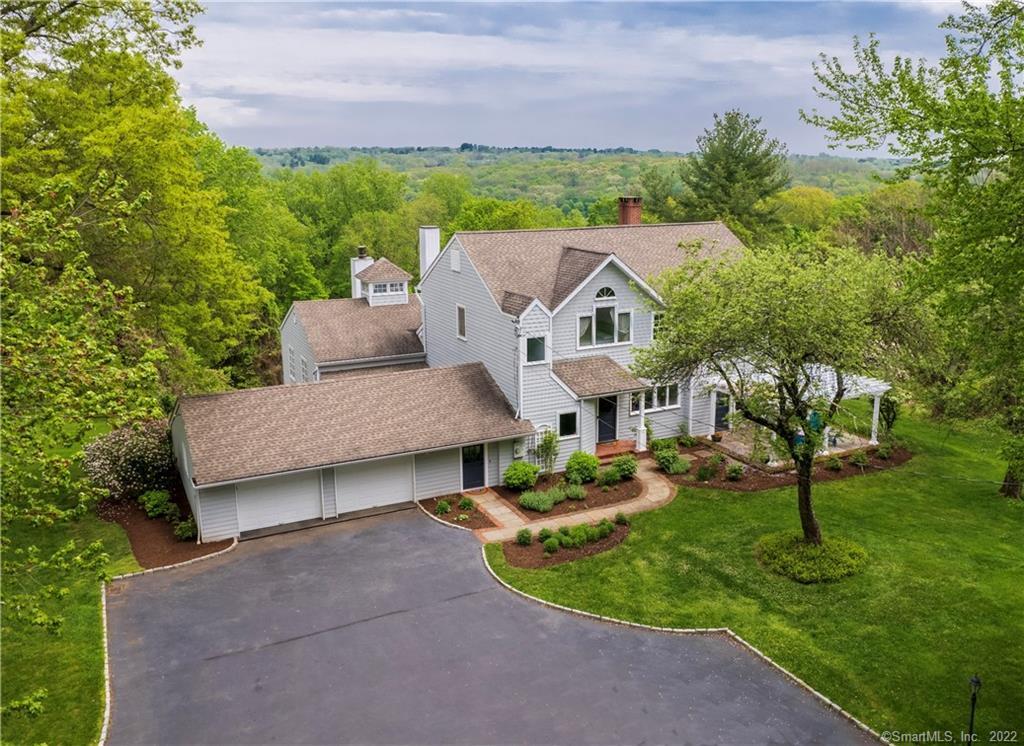 40 Warncke Road Wilton, CT 06897 - Photo 1 of 1 a view of a house with a garden