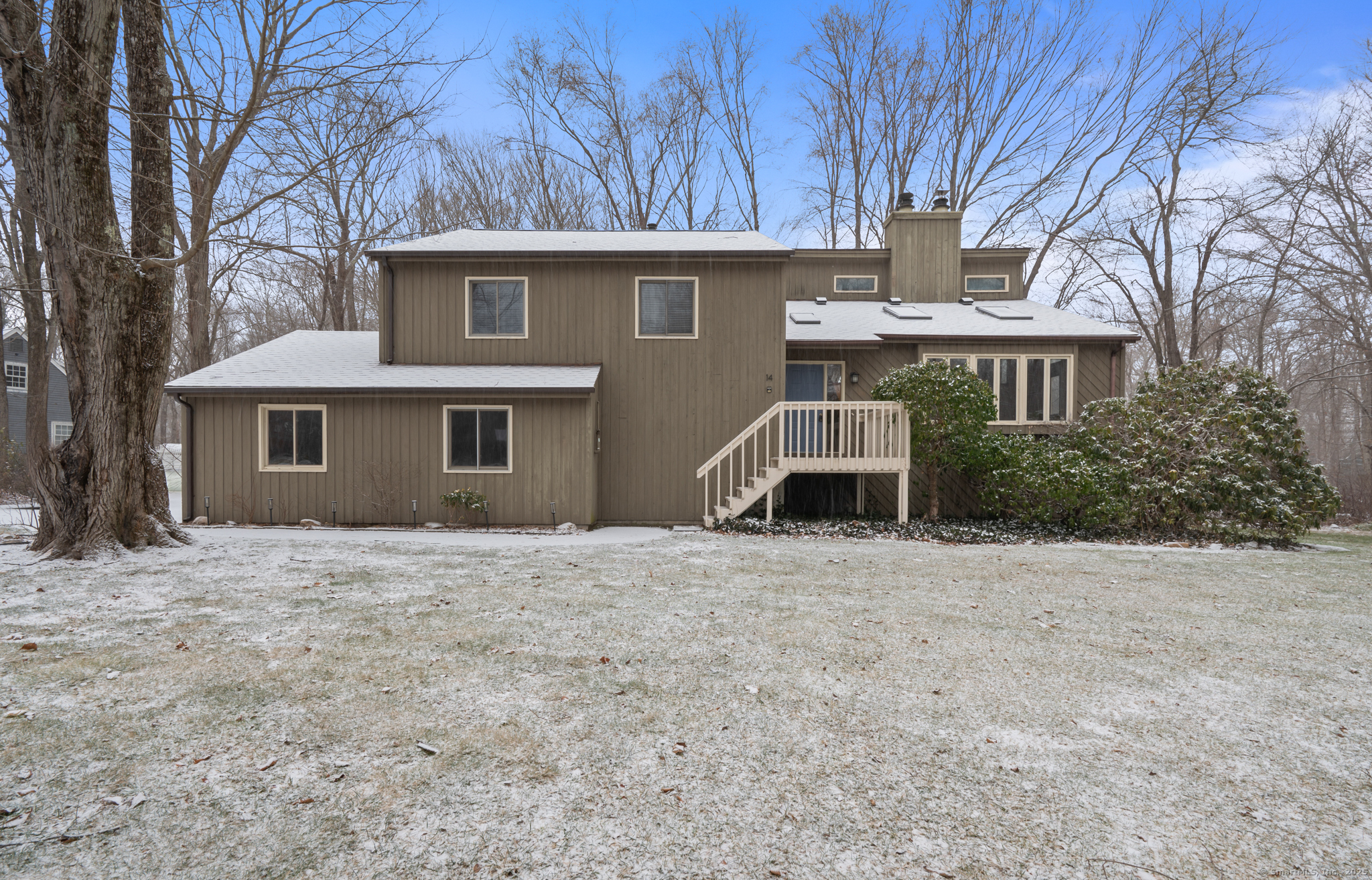 14 William Drive East Hampton, CT 06424 - Photo 1 of 1 a front view of a house with a yard and garage