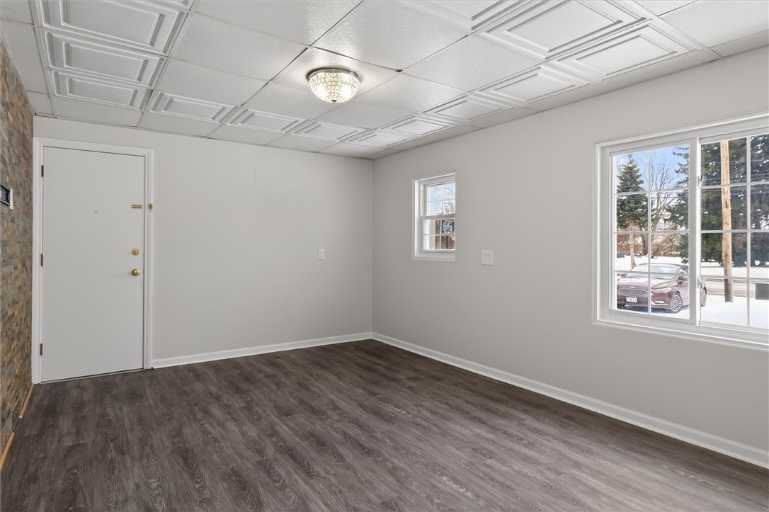 1490 Ridgeway Avenue Greece, NY 14615 - Photo 6 of 35 NEW VINYL PLANK FLOORING (2025)