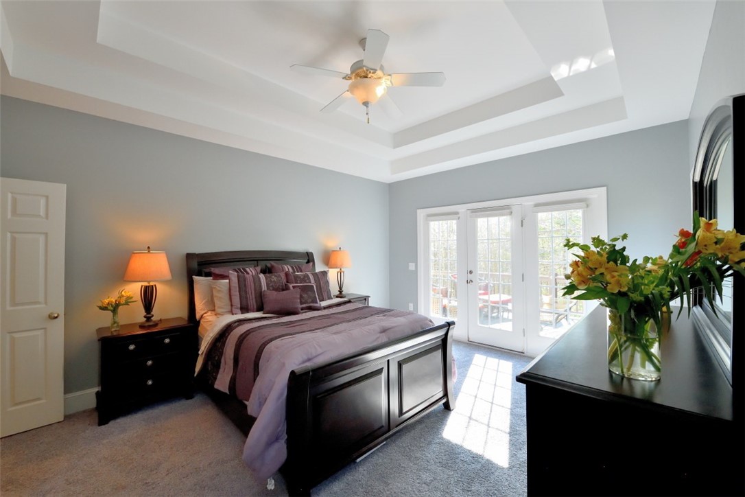 114 Bancroft Court Central, SC 29630 - Photo 12 of 35 Master bedroom with tray ceiling and door leading