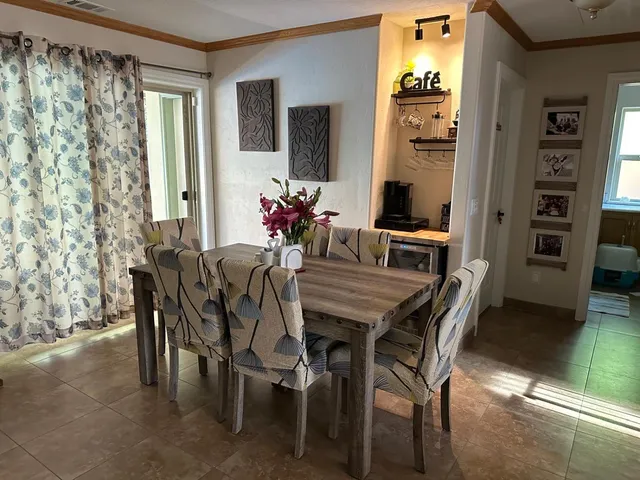 a bedroom with a bed and a television