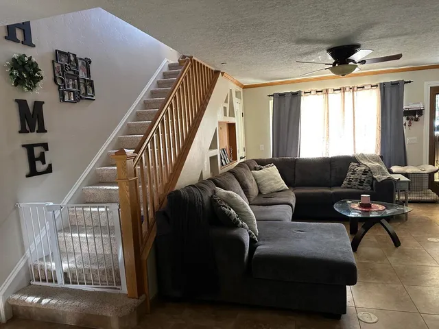 a view of a patio with a table and chairs