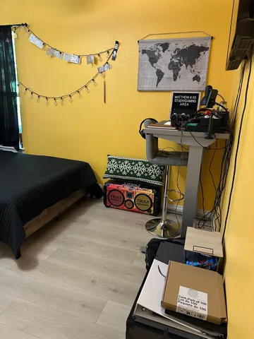 a view of a house with swimming pool and yard