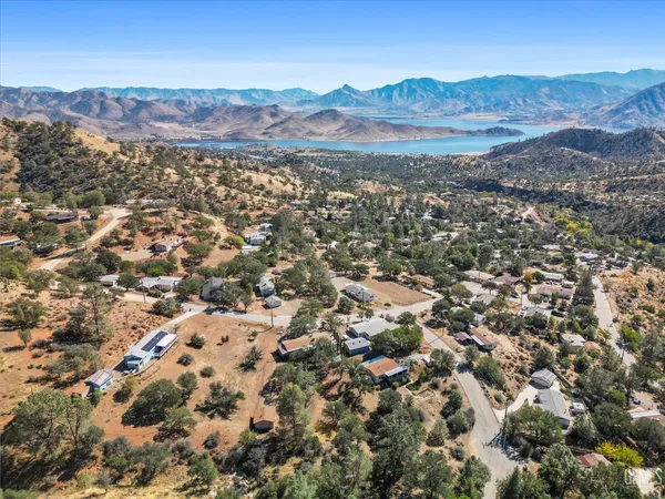 an aerial view of residential house and green space