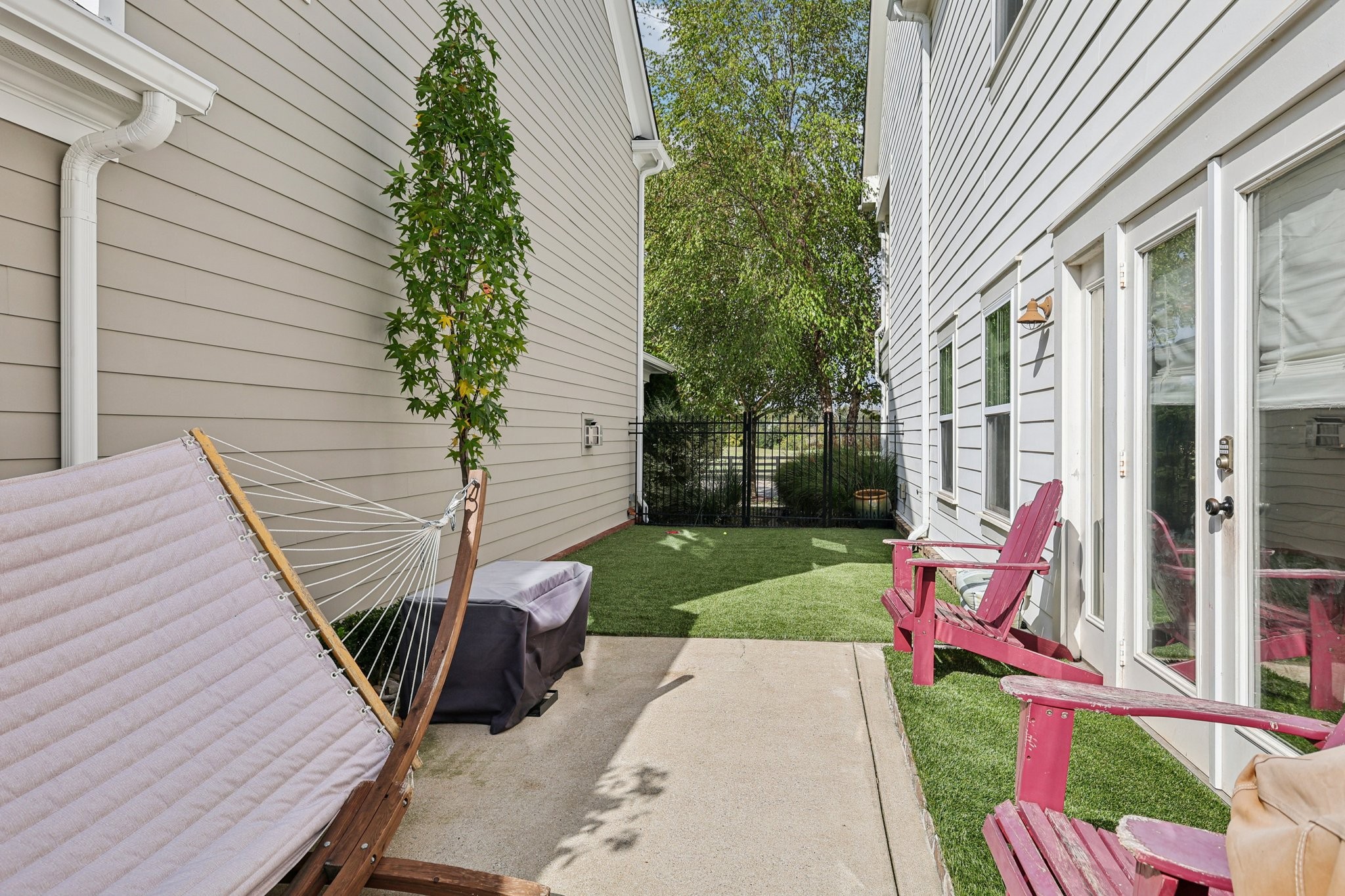 4129 River Links Drive Spring Hill, TN 37174 - Photo 22 of 33 a view of a chair and table in backyard of the house