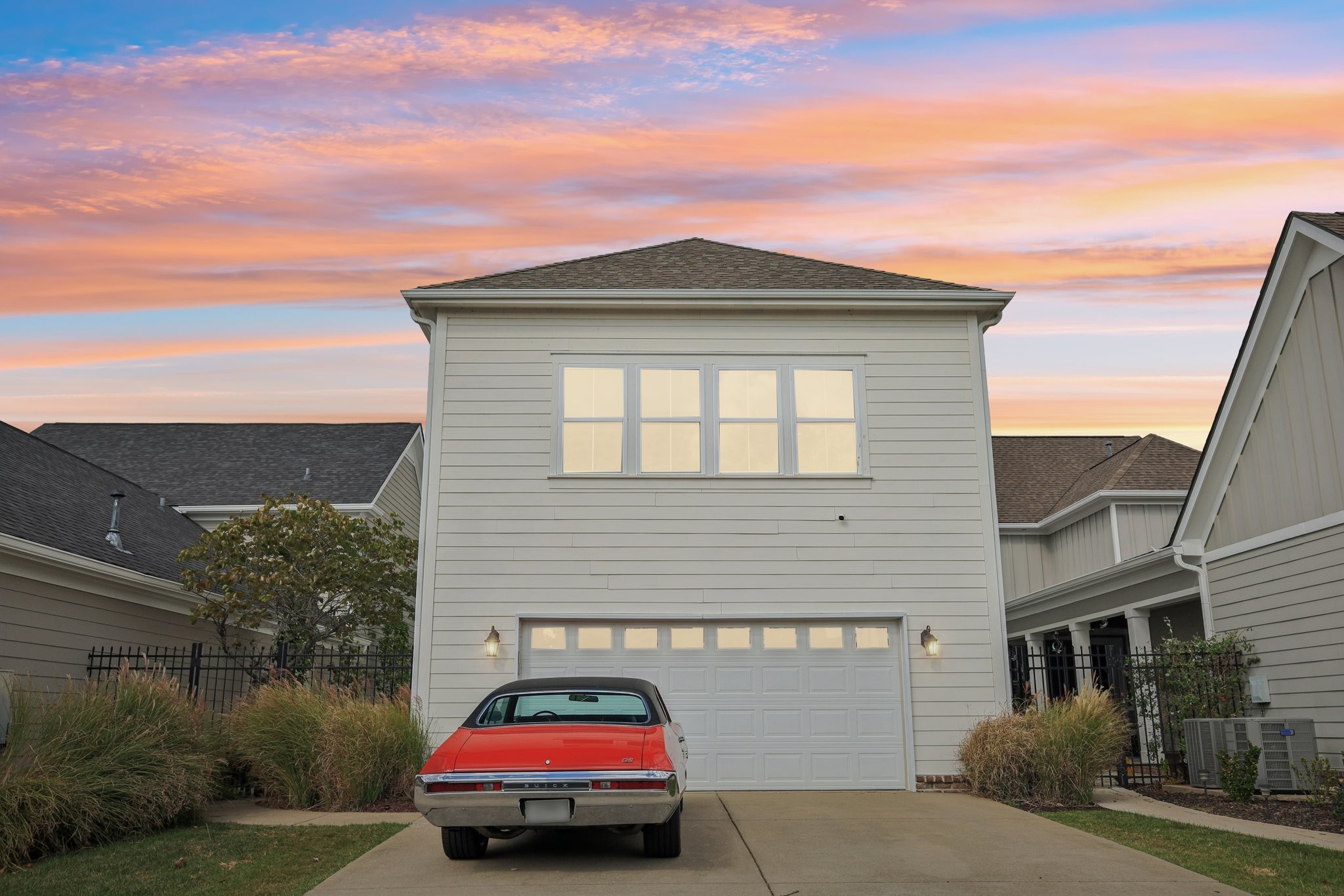 4129 River Links Drive Spring Hill, TN 37174 - Photo 30 of 33 a car parked in front of a white house
