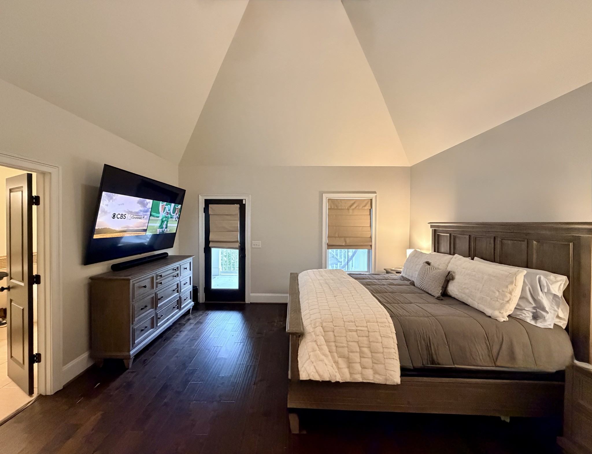 4129 River Links Drive Spring Hill, TN 37174 - Photo 32 of 33 a bedroom with a bed and a flat screen tv