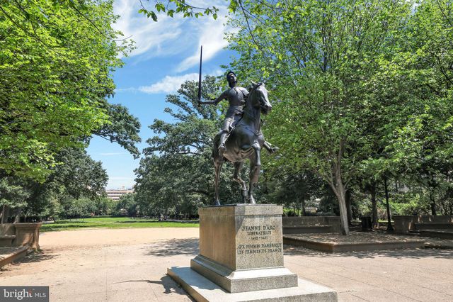 a view of a swimming pool with a yard