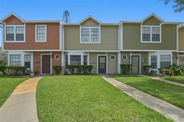 front view of a house with a yard