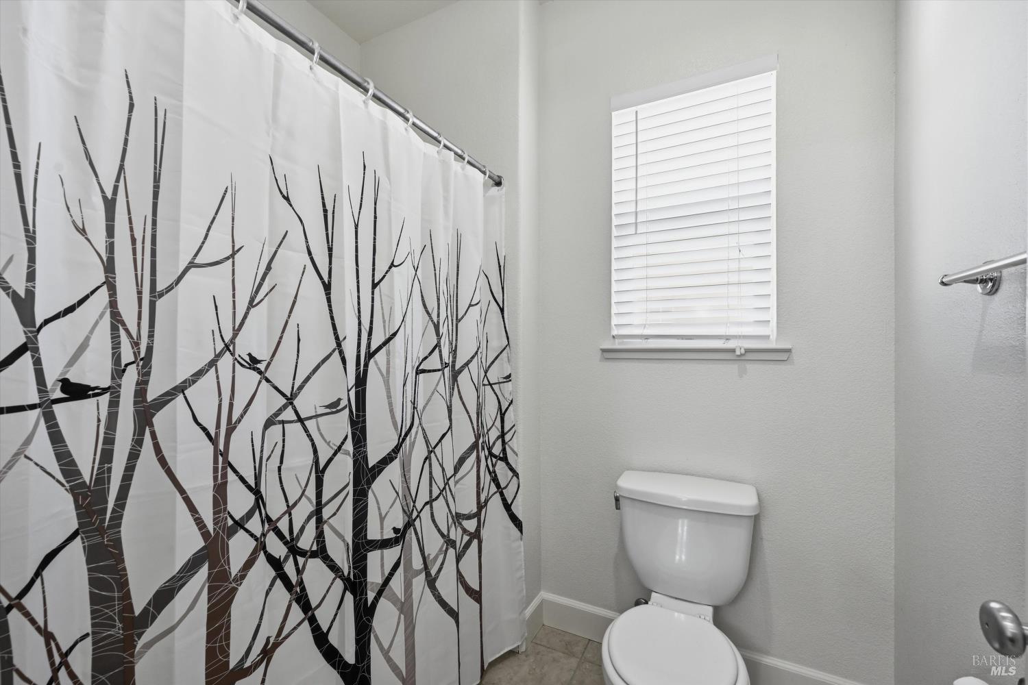 2017 Verbena Drive Santa Rosa, CA 95404 - Photo 26 of 33 The Upper level full bath has a door between the sink area and the tub/shower/toilet area