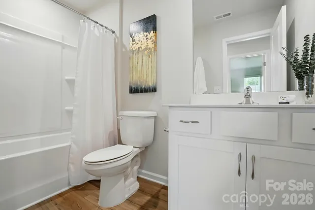 a view of livingroom with furniture and wooden floor