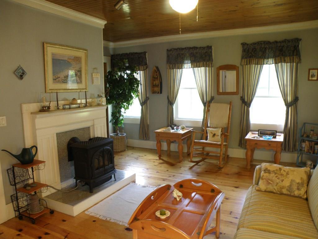197 Tannery Loop Ellsworth, ME 04605 - Photo 9 of 34 Pumpkin pine floored living room