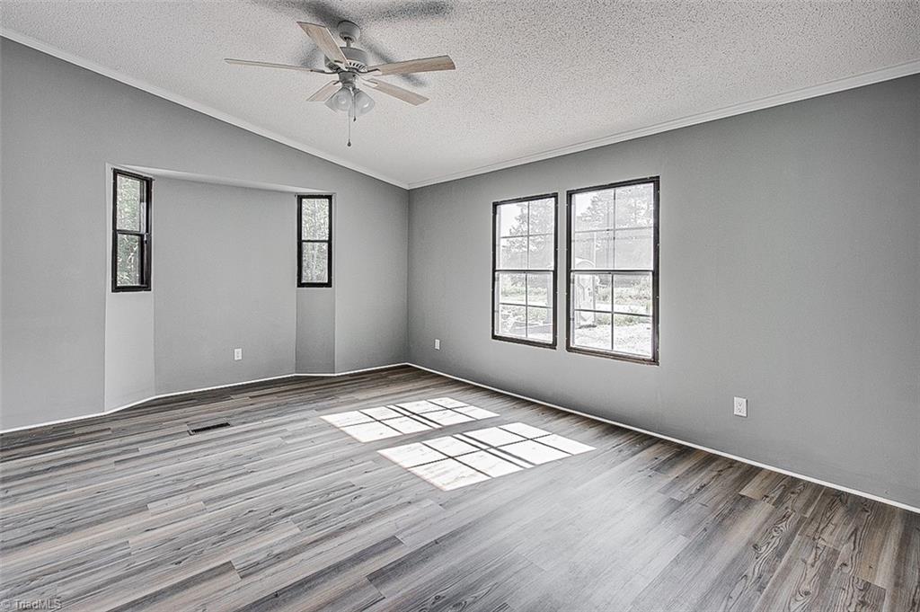 636 Ward Road Staley, NC 27355 - Photo 18 of 29 Primary Bedroom