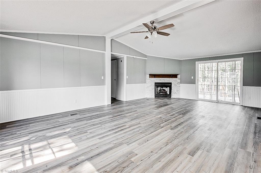 636 Ward Road Staley, NC 27355 - Photo 7 of 29 Great room from front door.