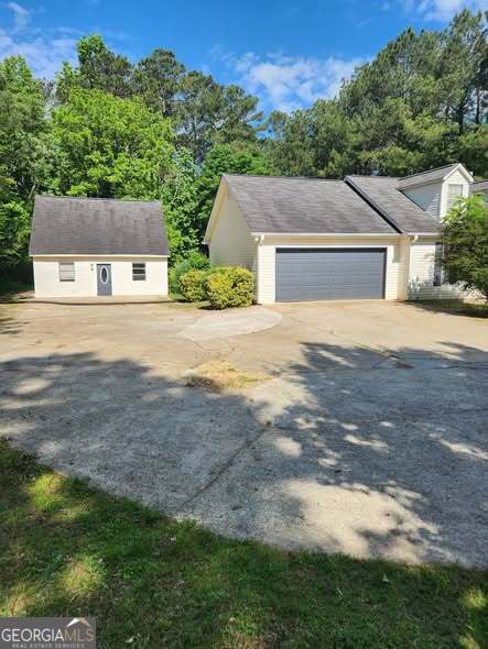 1752 Highway 162 Covington, GA 30016 - Photo 3 of 45 front view of house with a yard