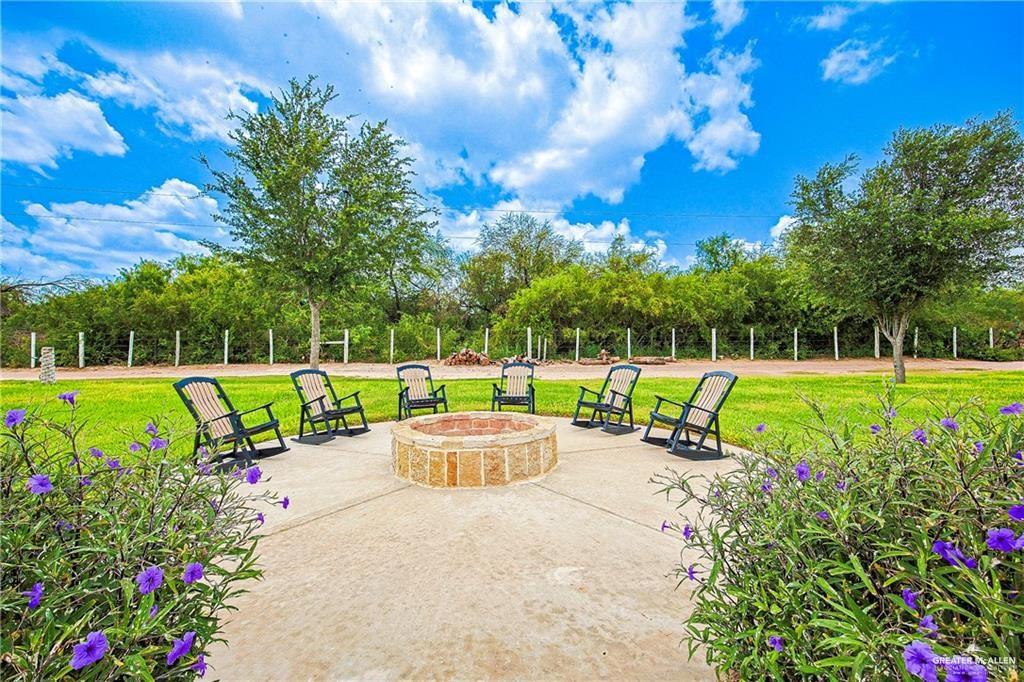 4835 Bryan Road Palmhurst, TX 78573 - Photo 34 of 45 a view of a park with swings and slides