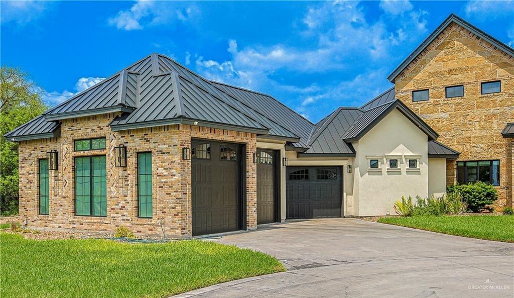4835 Bryan Road Palmhurst, TX 78573 - Photo 6 of 45 a front view of a house with a yard