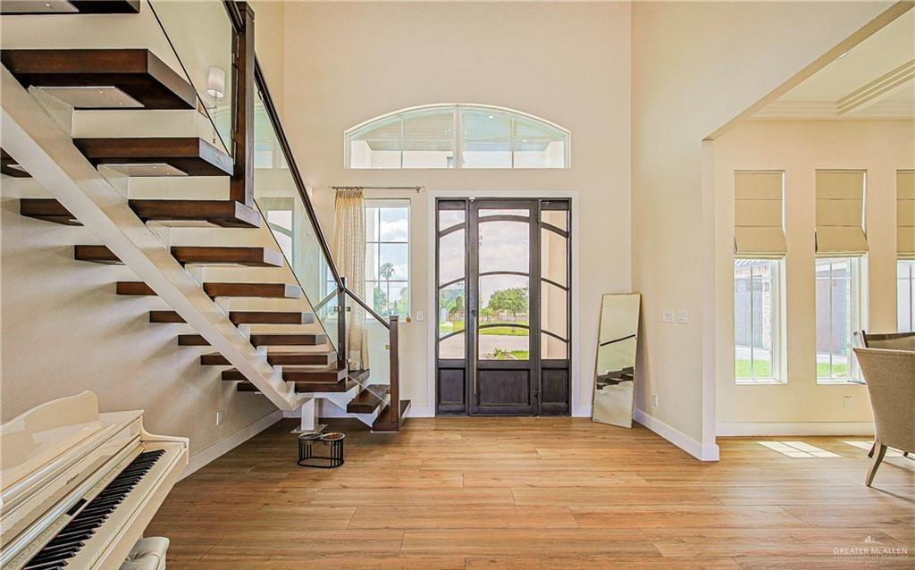 4835 Bryan Road Palmhurst, TX 78573 - Photo 7 of 45 a view of entryway with wooden floor and windows