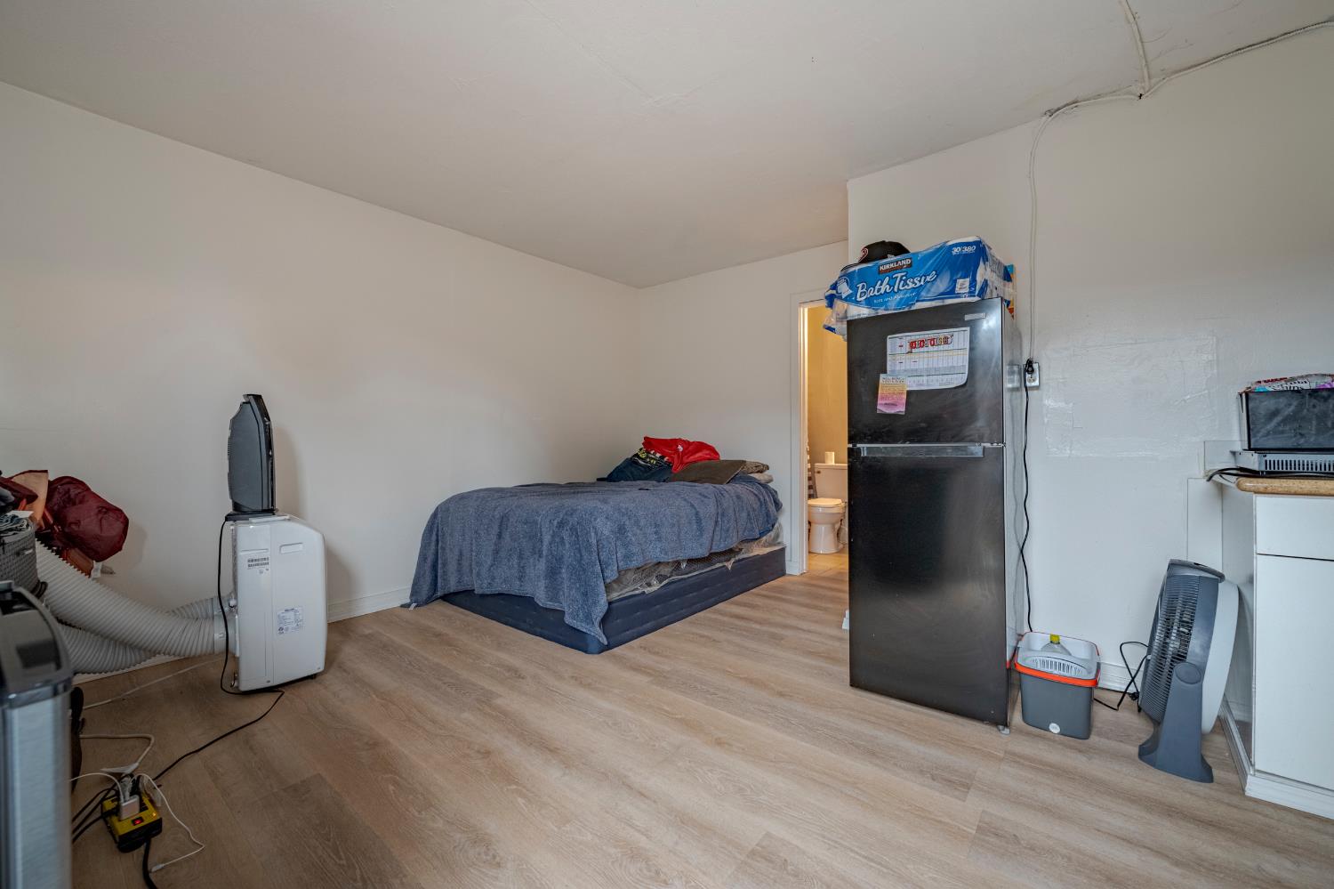 1595 East 26th Street Merced, CA 95340 - Photo 31 of 34 a bedroom with bed and a closet