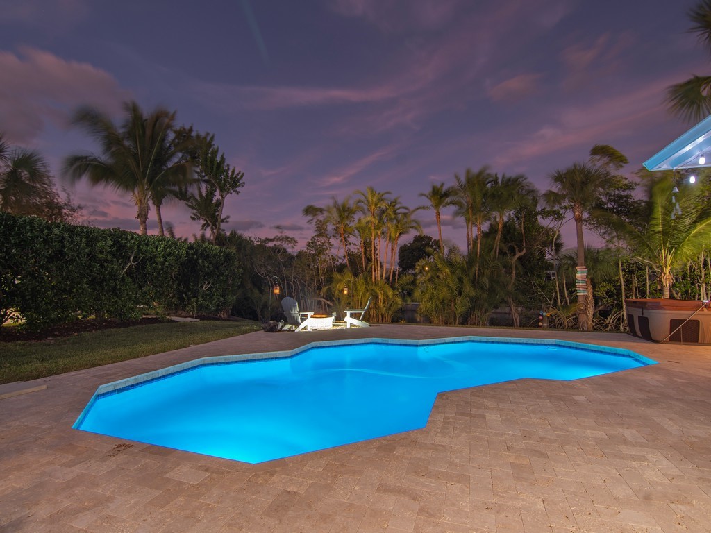 1 Cache Cay Drive Vero Beach, FL 32963 - Photo 35 of 36 a view of swimming pool with an outdoor space and seating area