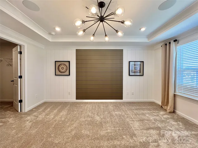 a view of livingroom with window and a ceiling fan
