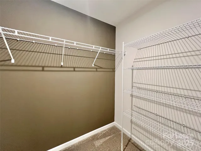 a view of a room with racks on the wall