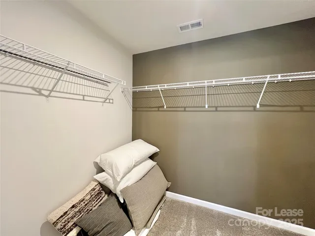 a view of a room with racks on the wall