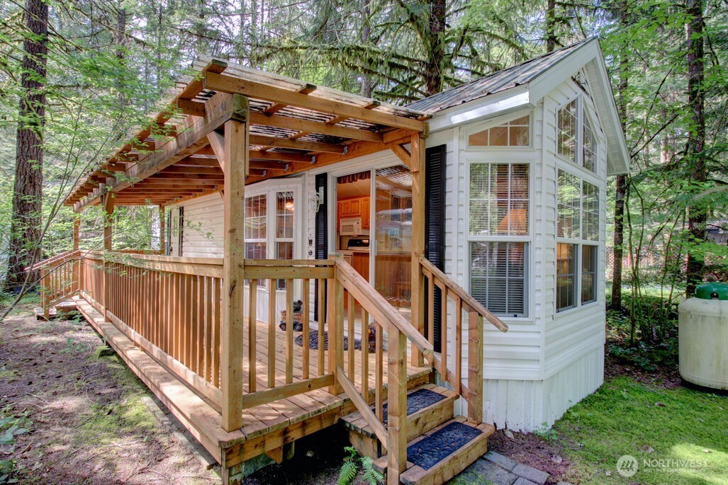 134 Drial Loop Maple Falls, WA 98266 - Photo 3 of 36 a view of a house with backyard and porch