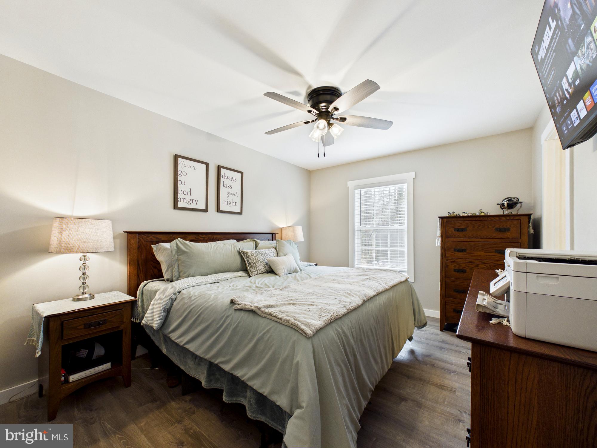25095 Trunk Line Road Henderson, MD 21640 - Photo 12 of 39 Serene bedroom with cozy ambiance.