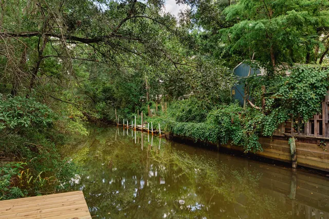 a view of a lake with a house