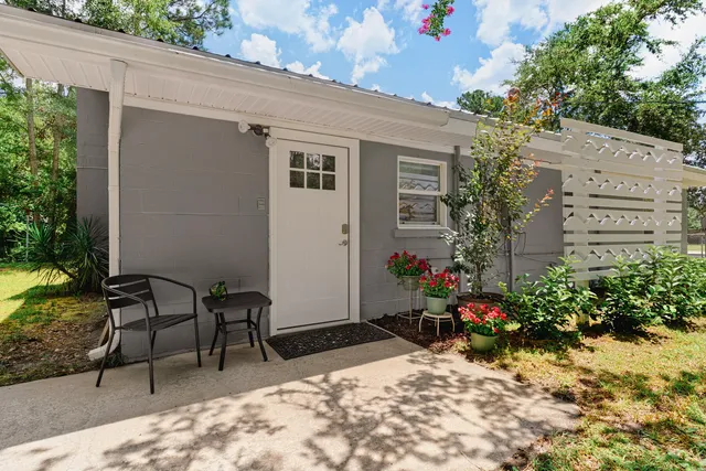a view of a potted plants in front of a house