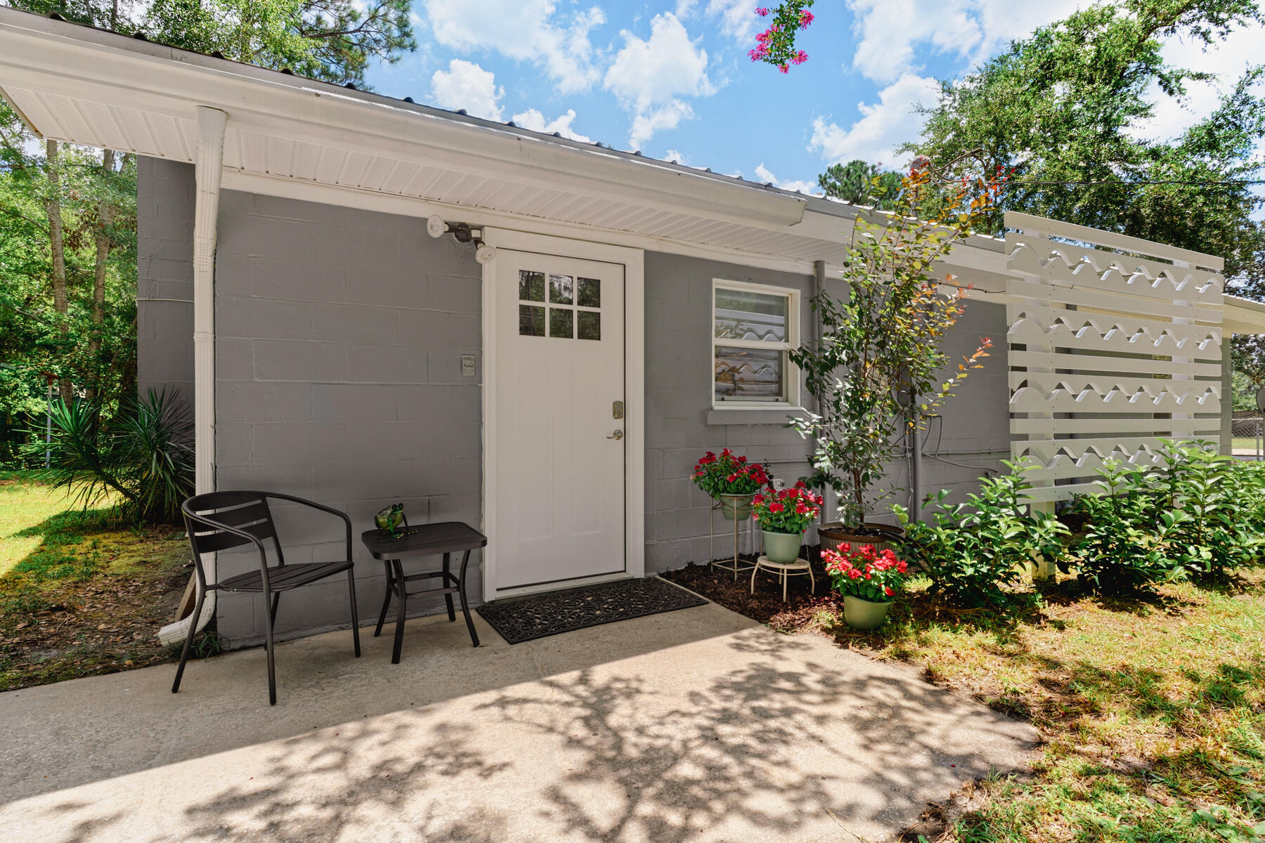 771 Alaqua Drive Freeport, FL 32439 - Photo 4 of 23 a view of a potted plants in front of a house