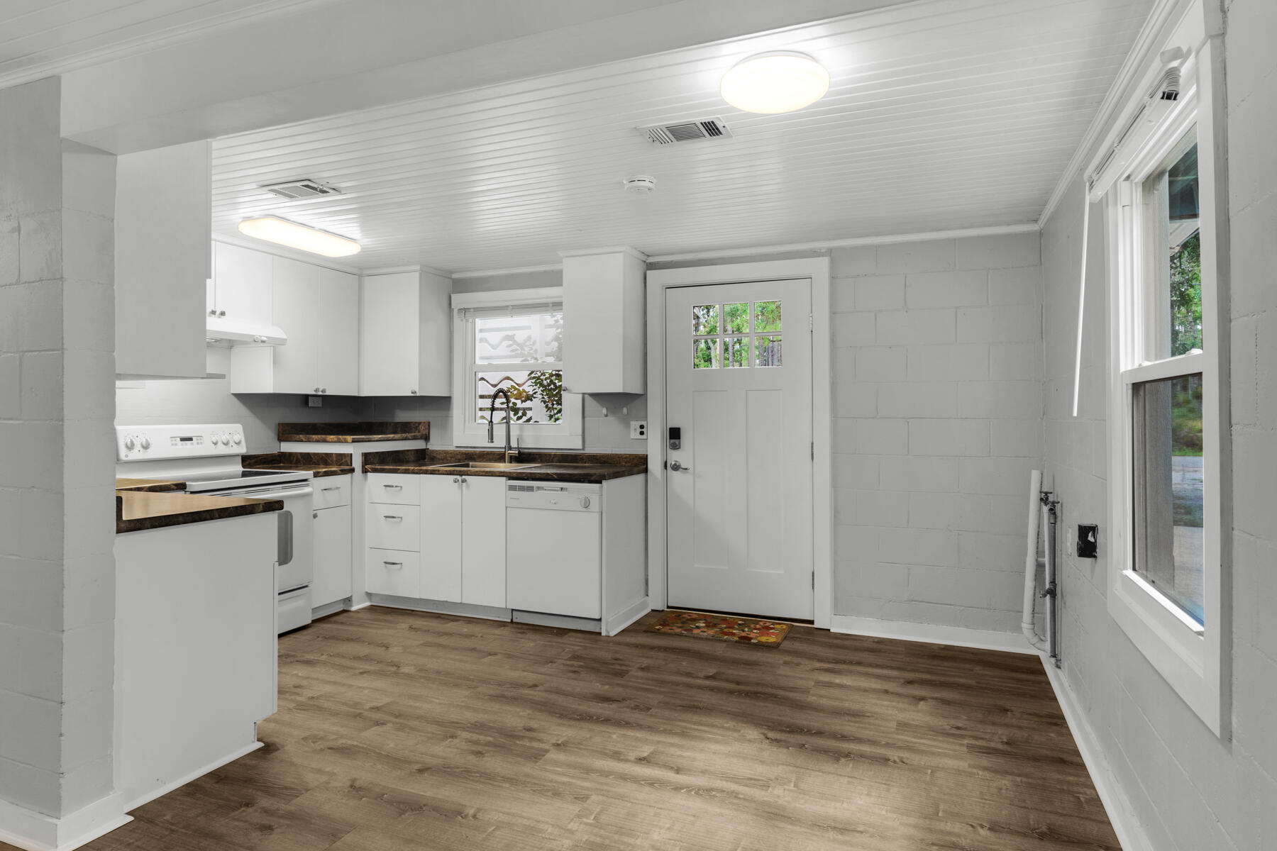 771 Alaqua Drive Freeport, FL 32439 - Photo 8 of 23 a kitchen with a refrigerator and window