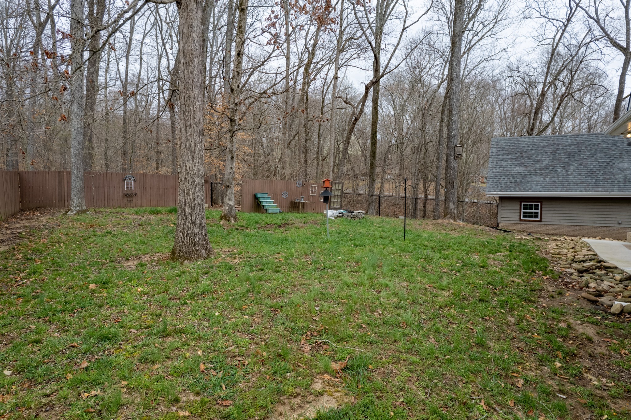 550 Laurel Crown Road Manchester, TN 37355 - Photo 12 of 87 a view of a backyard with large trees