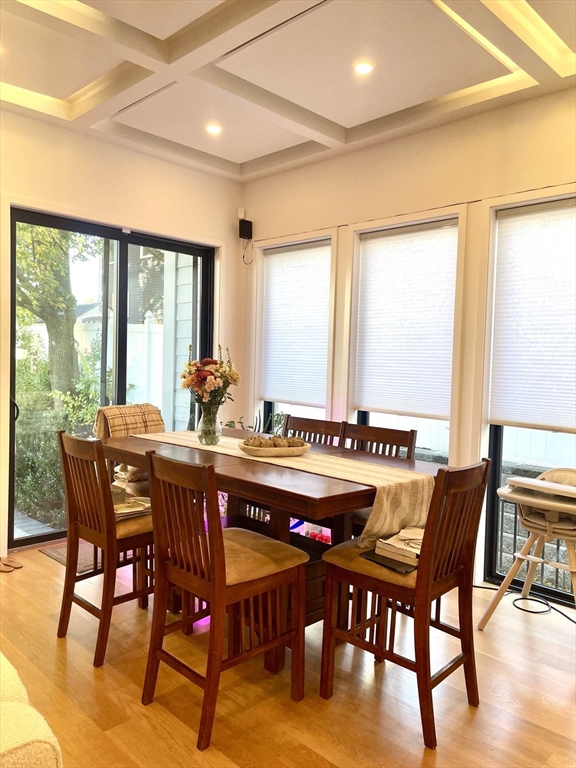 61 Allison Street, Unit 2 Newton, MA 02458 - Photo 2 of 26 a view of a dining room with furniture window and outside view
