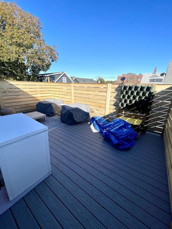 61 Allison Street, Unit 2 Newton, MA 02458 - Photo 21 of 26 a view of a swimming pool with seating space