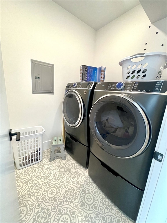 61 Allison Street, Unit 2 Newton, MA 02458 - Photo 22 of 26 a utility room with dryer and washer