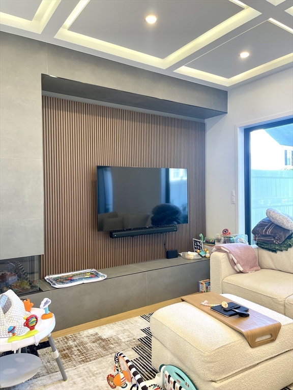 61 Allison Street, Unit 2 Newton, MA 02458 - Photo 3 of 26 a bedroom with a bed and window