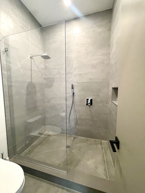 61 Allison Street, Unit 2 Newton, MA 02458 - Photo 6 of 26 a bathroom with a shower
