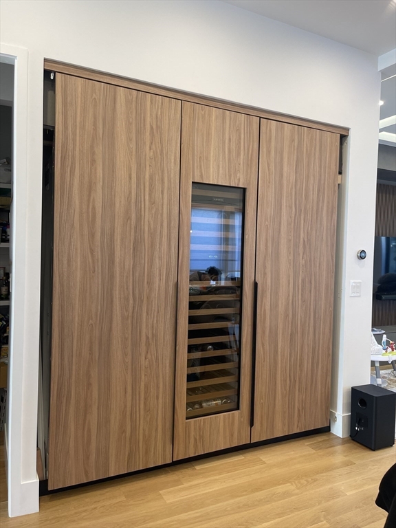 61 Allison Street, Unit 2 Newton, MA 02458 - Photo 10 of 26 a view of a room with wooden floor and closet